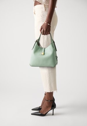 DECO CROSSBODY TOTE - 手提包 - 开心果冰